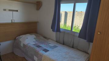 2 quartos, acesso à internet, roupa de cama