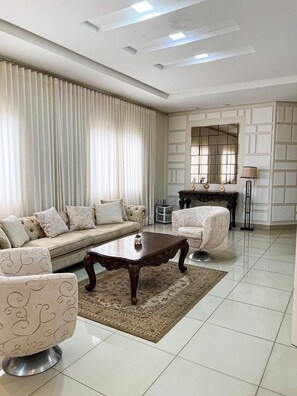 Apartment | Living area | Flat-screen TV