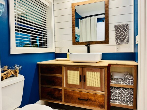 Eco-friendly toiletries, hair dryer, towels, soap