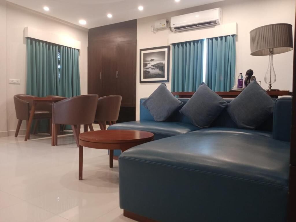 Family Suite, Courtyard View | Living area | TV