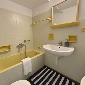 Hair dryer, towels, soap, toilet paper