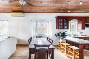 Dining - Tropical Sunset at Sunset Villas in West End, 2 bd Condo  (West End)