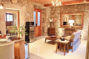 Luxury Suite, 1 Bedroom, Non Smoking, Kitchen | Living area | 32-inch LED TV with digital channels, Netflix, streaming services