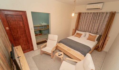 Danshari Room B-2 (Parking-Breakfast included) Malecon-Beaches 10 minutes away