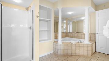 Shower, jetted tub, towels