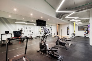 Work out in style with a variety of fitness equipment, including treadmills, an elliptical trainer, and a stationary bike.