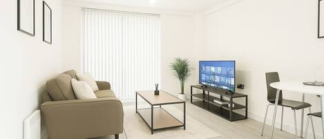 Apartamento | Área de estar | Lareira