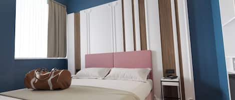 Habitación doble Deluxe | Ropa de cama de alta calidad y edredón