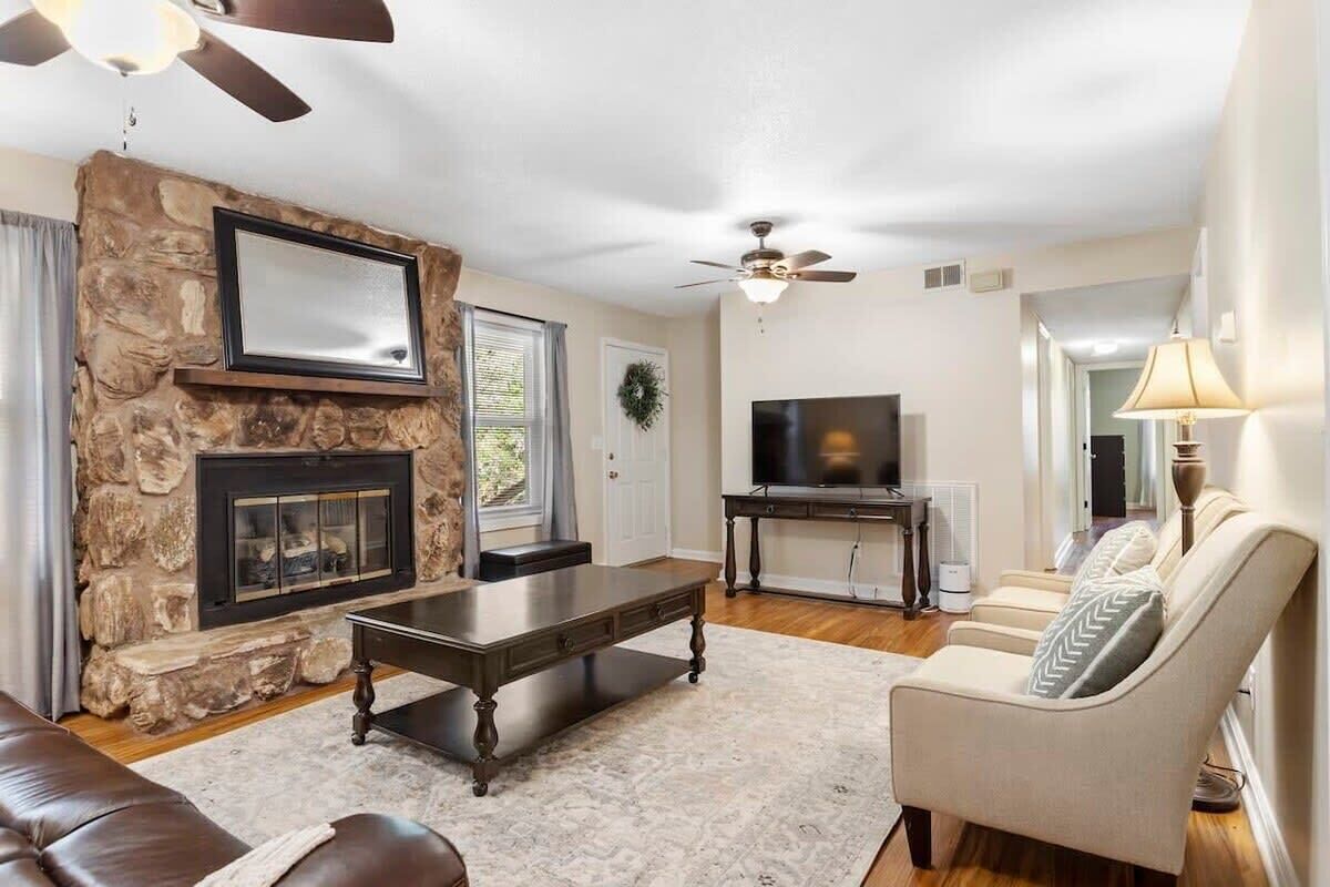 TV, fireplace, books, offices