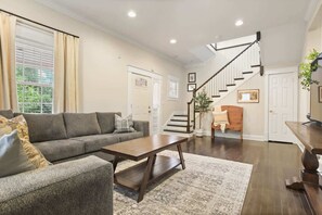 TV, fireplace, books, offices