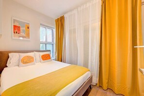 2 dormitorios, tabla de planchar con plancha, wifi gratis y ropa de cama