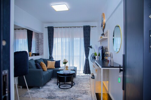 Urban View Apartment with a fully equipped gym, rooftop serene town views
