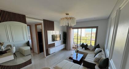 "Vue Imprenable sur Parc/Plage - Confort et Tranquillité à Proximité