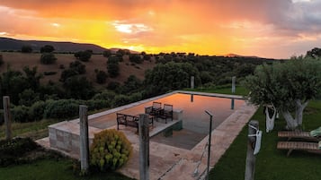 Outdoor pool, pool umbrellas, sun loungers