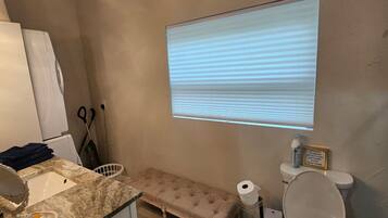 Hair dryer, towels, soap, toilet paper