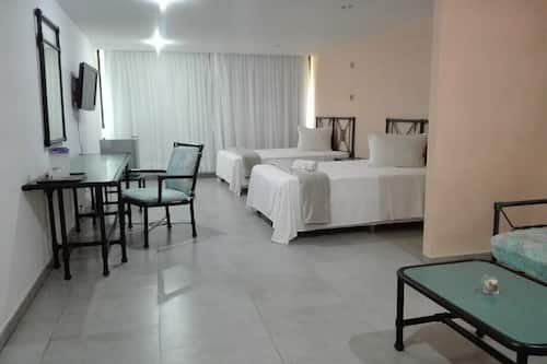 Laptop workspace, rollaway beds, bed sheets