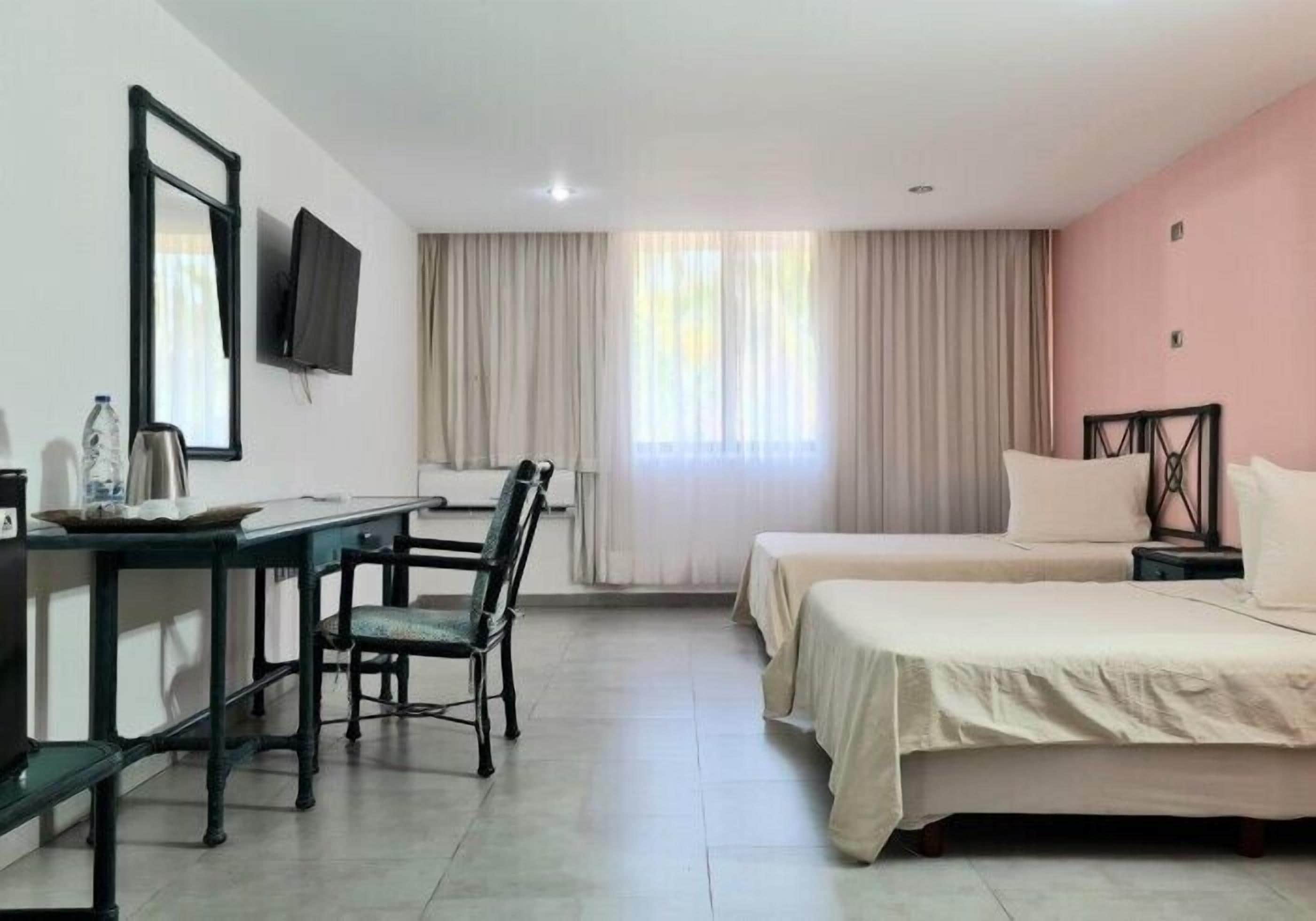 Laptop workspace, rollaway beds, bed sheets