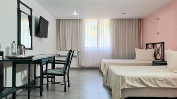 Laptop workspace, rollaway beds, bed sheets