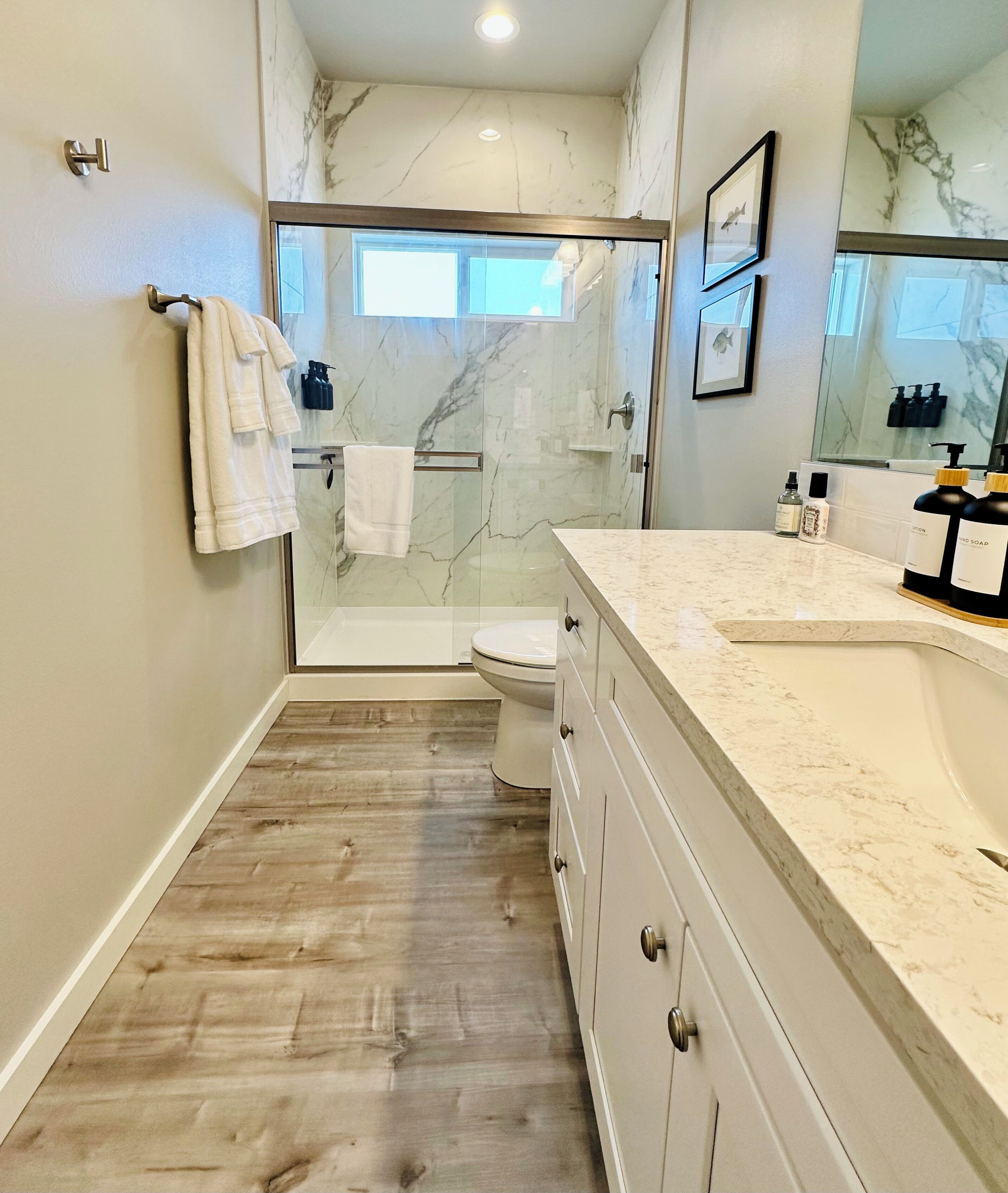 Shower, hair dryer, towels, soap