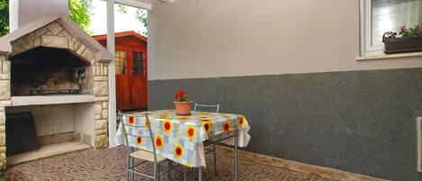 Estudio, 1 habitación, Terraza, vista al jardín | Restaurante al aire libre