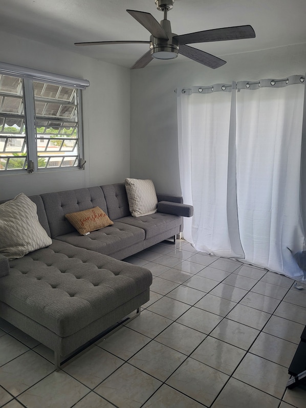 Living area - Cozy and luxurious apartment 15 minutes from the airport and beautiful beaches. (Carolina)