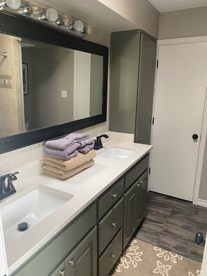 Shower, towels, soap, toilet paper