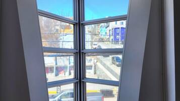 Apartamento superior, 1 cama Queen, cozinha americana, vista para a cidade | Vista para a cidade