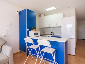 Fridge, microwave, coffee/tea maker, electric kettle