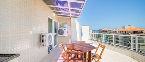 Departamento Deluxe, 3 habitaciones, aire acondicionado | Restaurante al aire libre