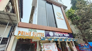 A hotel named "Prime Suites" with a signboard indicating "Hotel Prime Suites" and "Hotel Prime Suites" in another language. - Hotel Prime Suites Airoli (Navi Mumbai)