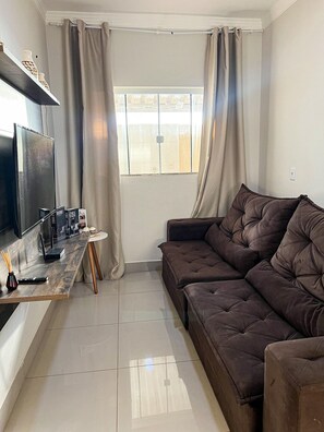 Standard Apartment | Living area | Flat-screen TV