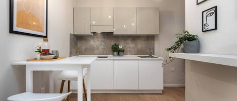 Fridge, microwave, stovetop, coffee/tea maker