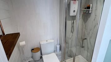 Shower, towels, soap, shampoo