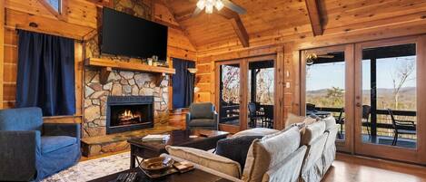 Téléviseur, foyer, lecteur de DVD, table de baby-foot