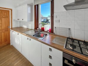 Dishwasher, highchair, cookware/dishes/utensils