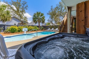 Outdoor pool, a heated pool - Backyard Oasis! 
Brand New Listing - Heated Pool & Hot Tub! (Oak Island)