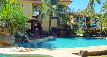 2-bedroom apartment in beautiful gated community 3 pools nearby Tamarindo Beach.