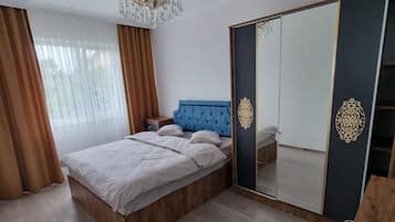 Family Apartment, Sea View | 2 bedrooms, in-room safe, iron/ironing board, free WiFi