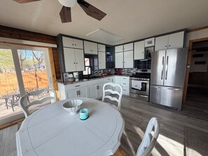 Fridge, microwave, oven, stovetop - Finch House on Lake Osakis: Charming 2-bedroom cabin (Osakis)