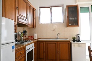 Een koelkast, een oven, een vaatwasser