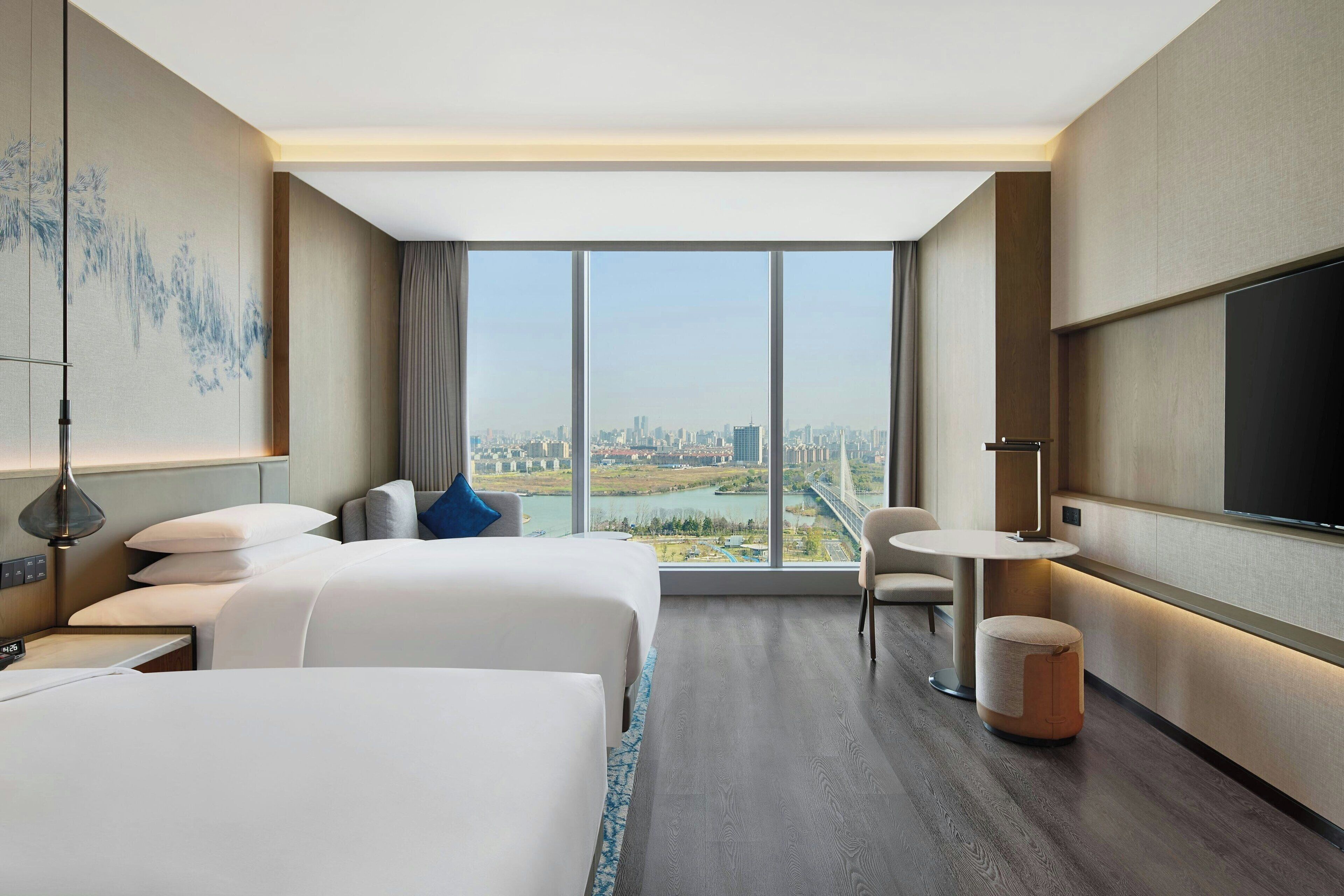 Deluxe Room, 2 Double Beds | Minibar, in-room safe, blackout drapes, free cribs/infant beds