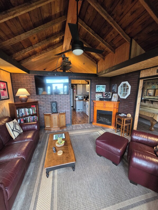 Smart TV, fireplace, foosball, books