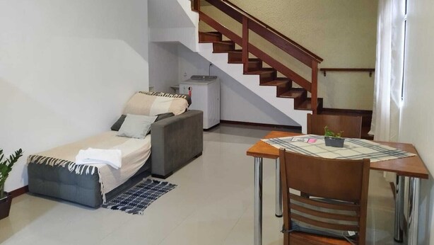 Interior - Cozy studio close to the airport and beaches. (Carianos Florianópolis)