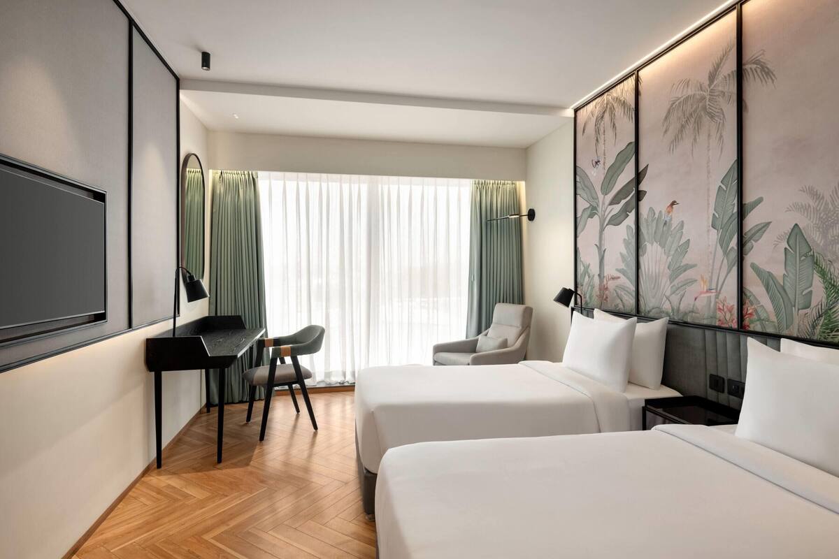 Habitación individual superior, 1 cama individual | Minibar, caja de seguridad en la habitación y escritorio