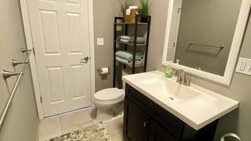 Hair dryer, towels, soap, toilet paper