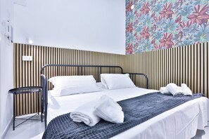 3 habitaciones, tabla de planchar con plancha, wifi y ropa de cama 