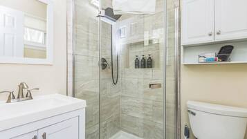 Shower, jetted tub, hair dryer, towels