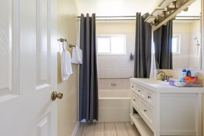 Shower, jetted tub, hair dryer, towels