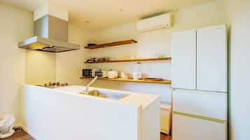 Fridge, microwave, stovetop, cookware/dishes/utensils