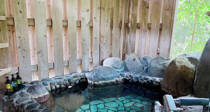 Up the outdoor stairs youll find an openair natu / Ito Shizuoka